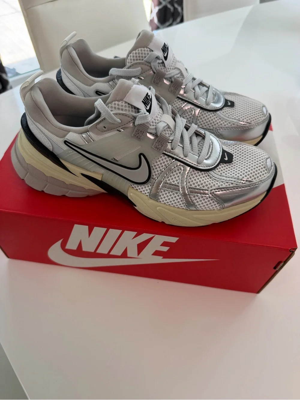 Women Nike V2K sneakers.